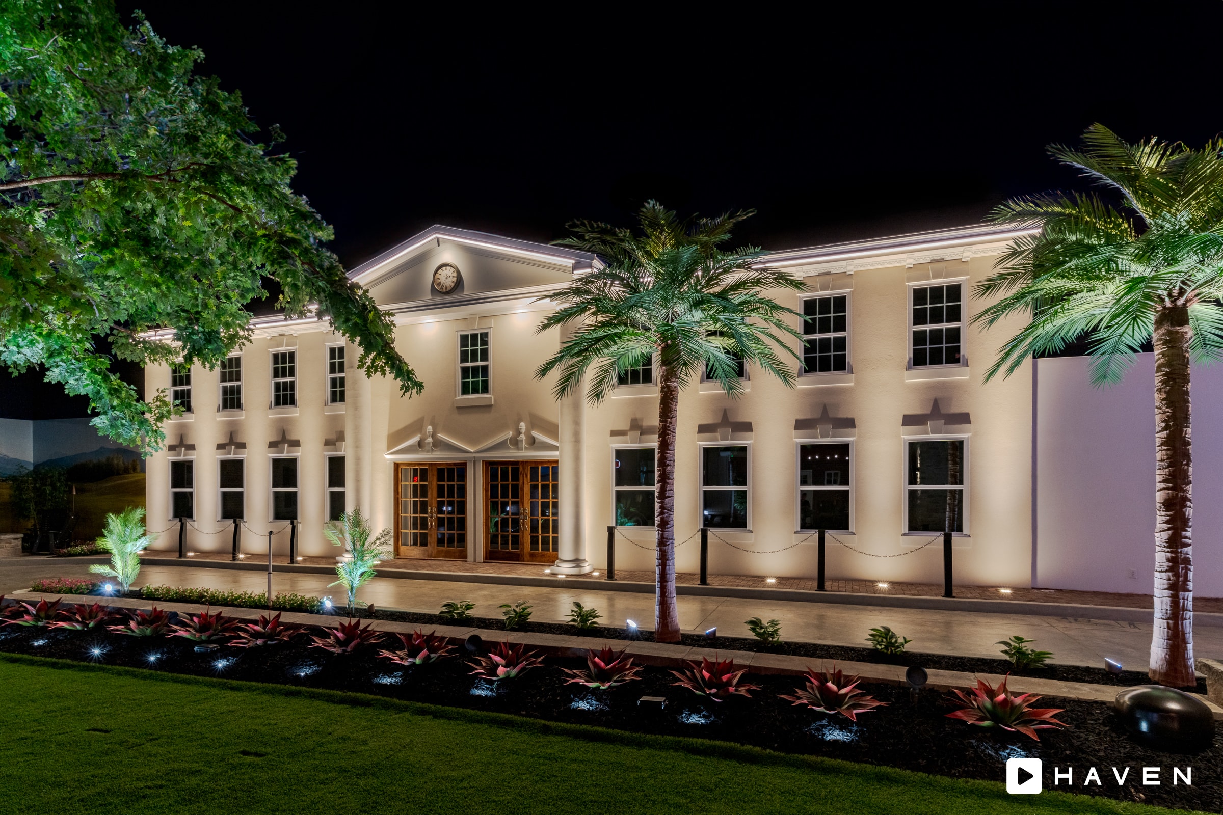Permanent roofline lighting installed along the architecture of a home